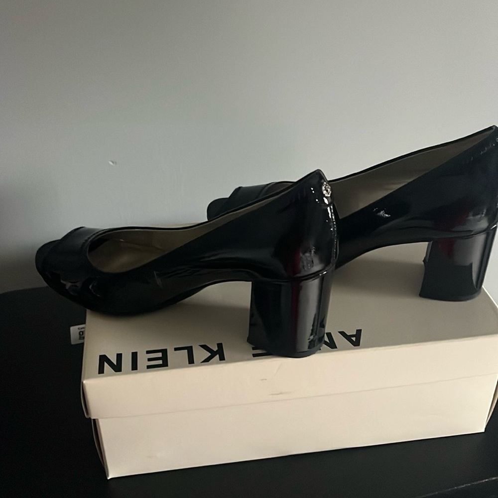 Ann Klein peep to black heels like new wore only once